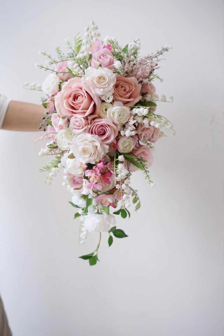 Cascading Bridal Bouquet with Roses and Delicate Details