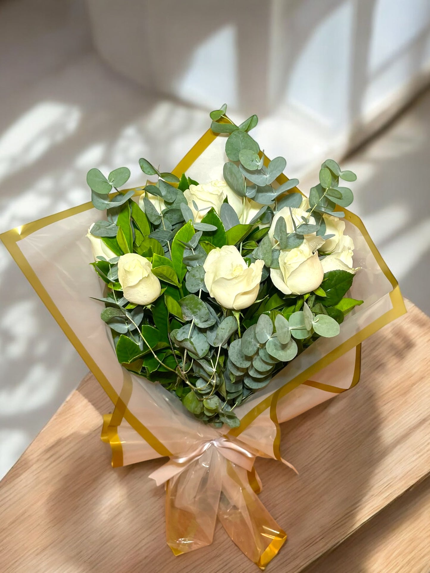Bouquet of White Colombian Roses with Eucalyptus – Twelve Roses in Luxurious Packaging