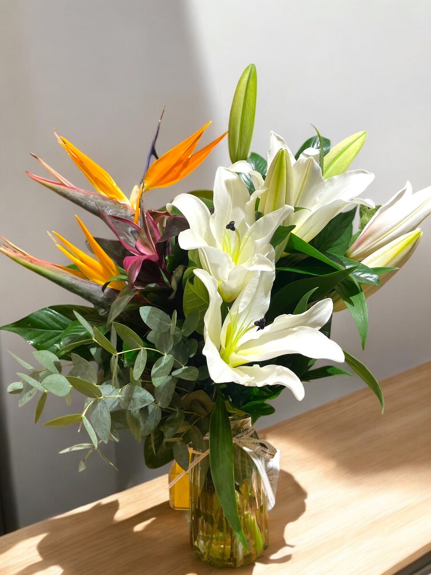 Elegant Arrangement with White Lilies and Bird of Paradise in a Glass Vase | ENROSE