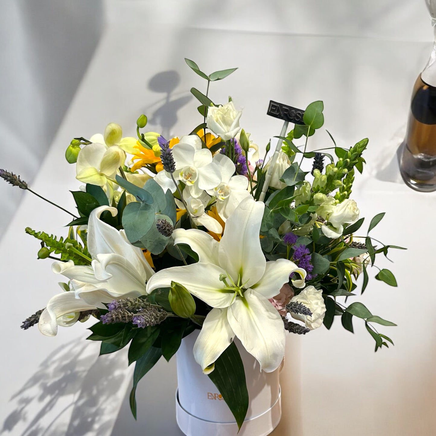 Arrangement of Lilies and Orchids in a Luxury Box - Elegance and Beauty