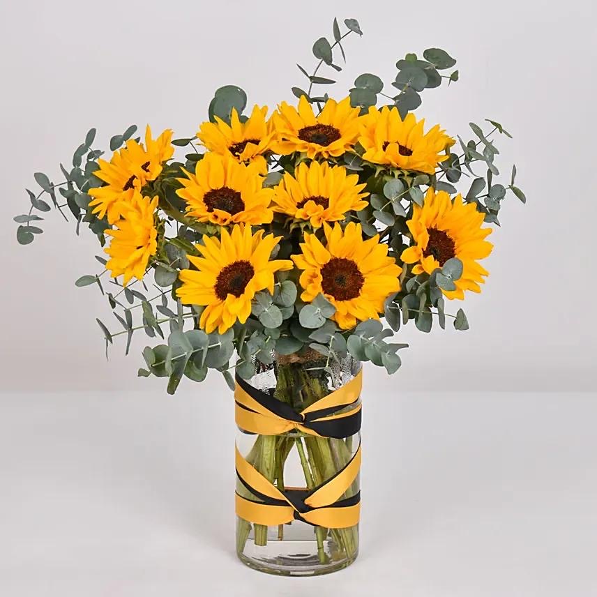 ‏Bouquet of Sunflowers in a Vase with Eucalyptus Foliage - Natural Elegance for Your Space