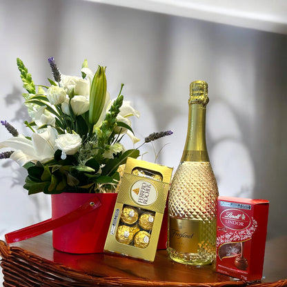 Basket of White Flowers with Orchids and Freixenet Sparkling Wine - A Luxury Gift