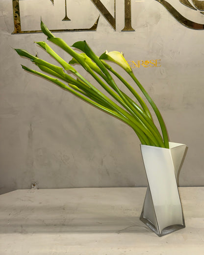 Arrangement of Calla Lilies with a Modern Crystal Vase