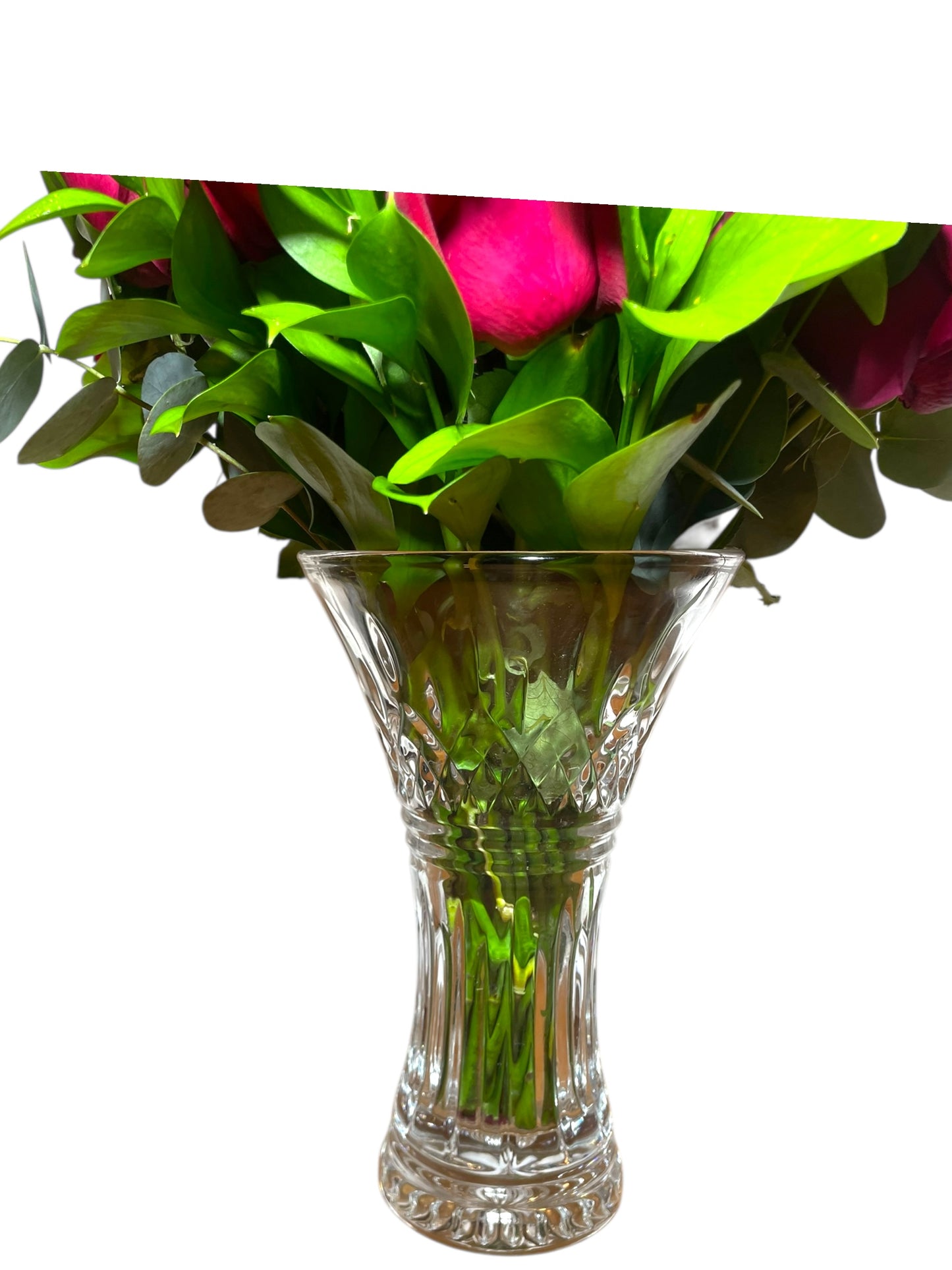 Luxurious bouquet with 24 natural red roses and eucalyptus in a glass vase.