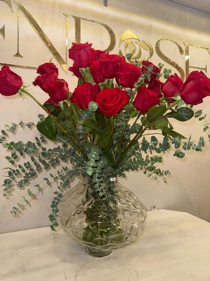 Classic arrangement with 50 Colombian red roses and a crystal vase.