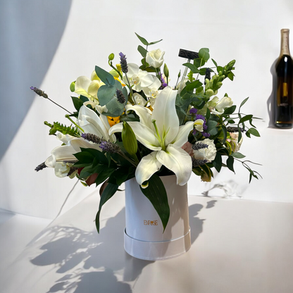 Arrangement of Lilies and Orchids in a Luxury Box - Elegance and Beauty