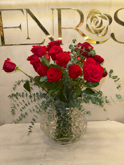 Classic arrangement with 50 Colombian red roses and a crystal vase.